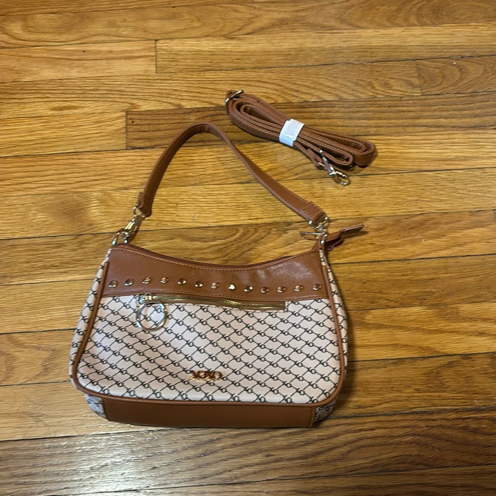 Never used XOXO tan purse with longer strap included.